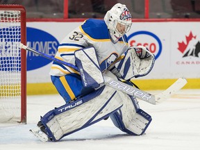 Buffalo Sabres goalie Michael Houser makes a save against the Ottawa Senators at the Canadian Tire Centre.