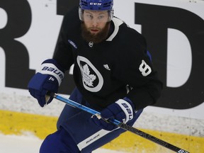 Injured Maple Leafs defenceman Jake Muzzin took part in pre-practice drills and stayed out for the first half of the workout on Monday before departing.