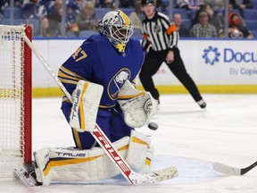 Sabres goaltender Malcolm Subban looks to make a glove save during third period NHL action against the Lightning at KeyBank Center in Buffalo, N.Y., Tuesday, Jan. 11, 2022.
