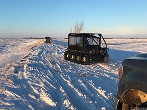 RCMP officers are shown near the town of Emerson, Manitoba on Wednesday, Jan. 19, 2022. Mounties say they have found the bodies of four people near the U.S. border.