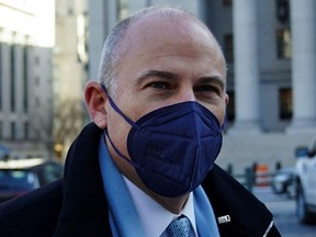 Former attorney Michael Avenatti walks away from court in the Manhattan borough of New York City, Friday, Jan. 21, 2022.