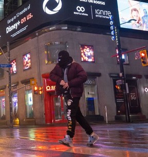 One of two suspects sought in a Dec. 12, 2021 armed mugging at Yonge and Dundas that left a person shot.