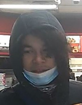 One of two suspects sought in a Dec. 12, 2021 armed mugging at Yonge and Dundas that left a person shot.