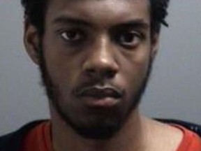 An image released by Toronto Police of Darriel Thompson, 21, who is wanted for two counts of second-degree murder in a Jan. 3, 2022 shooting.