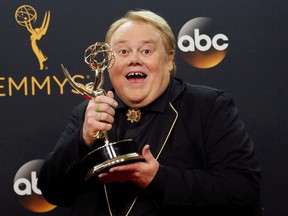 Louie Anderson poses backstage with his award for Best Supporting Actor in a Comedy Series for his role on the FX series "Baskets" at the 68th Primetime Emmy Awards in Los Angeles, Calif., Sept. 18, 2016.