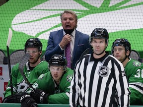 In this March 25, 2021 file photo, Rick Bowness yells to his team during the third period against the Tampa Bay Lightning at the American Airlines Center in Dallas, Texas.
