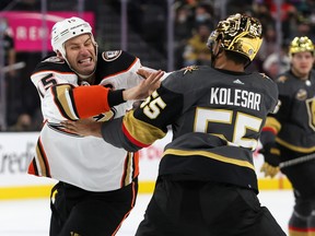 Ryan Getzlaf of the Anaheim Ducks and Keegan Kolesar of the Vegas Golden Knights fight in the second period of their game at T-Mobile Arena on Dec. 31, 2021 in Las Vegas, Nevada.
