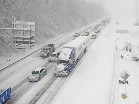 Vehicles are seen on an icy stretch of Interstate 95 closed as a storm blankets the U.S. region in snow, near Fredericksburg, Virginia, U.S. January 3, 2022.