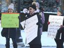 Browen Alsop, an Early Childhood Educator with two children, was part of a  small group of parents protesting outside the Ontario Legislature on Monday January 3, 2022. 
