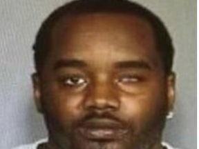 Suspected cop killer Lashawn McNeill, 47, was shot and killed.
