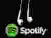 Headphones are seen in front of a logo of online music streaming service Spotify in this illustration picture taken in Strasbourg, Feb. 18, 2014.