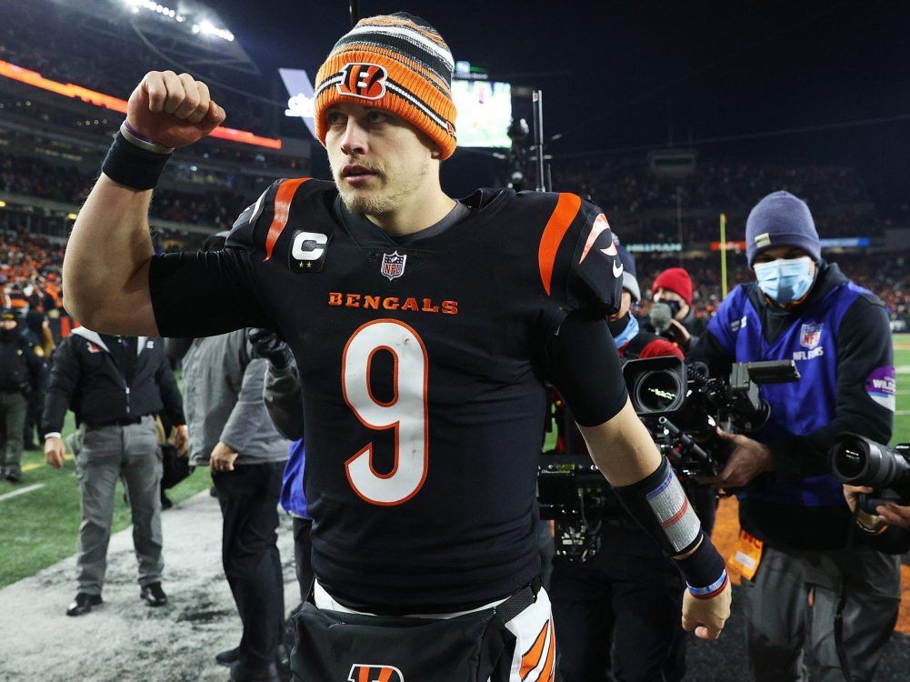 Bengals end lengthy drought without a playoff win by holding off Raiders