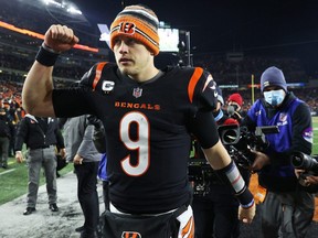 Quarterback Joe Burrow of the Cincinnati Bengals celebrates following his team's 26-19 win over the Las Vegas Raiders during the AFC Wild Card playoff game at Paul Brown Stadium on Jan. 15, 2022 in Cincinnati, Ohio.