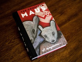 This photo taken in Los Angeles, California on January 27, 2022 shows the cover of the graphic novel "Maus" by Art Spiegelman.
