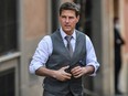 In this file photo taken on October 6, 2020 Tom Cruise is pictured during the filming of "Mission Impossible : Lybra" in Rome