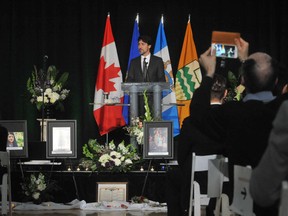 Canadian Prime Minister Justin Trudeau speaks at a memorial service for the victims of the Ukrainian Airlines Flight PS752 crash in Iran, at the Saville Community Sports Centre in Edmonton on Jan. 12, 2020.