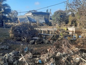 A general view shows damaged buildings following a volcanic eruption and tsunami, in Nuku'alofa, Tonga in this picture obtained from social media on Jan. 20, 2022.