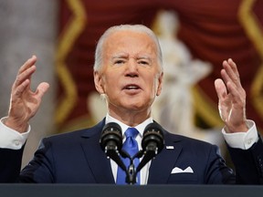 U.S. President Joe Biden speaks in Statuary Hall on the first anniversary of the January 6, 2021 attack on the U.S. Capitol by supporters of former President Donald Trump, on Capitol Hill in Washington, U.S., January 6, 2022.