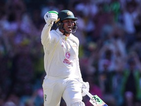 Australia's Usman Khawaja celebrates reaching his century (100 runs) on day four of the fourth Ashes cricket test between Australia and England at the Sydney Cricket Ground over this past weekend.