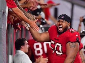 Vita Vea of the Tampa Bay Buccaneers celebrates after defeating the Buffalo Bills 33-27 in overtime at Raymond James Stadium on December 12, 2021 in Tampa, Florida.