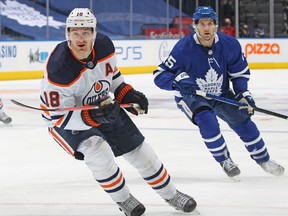 Edmonton Oilers' Zach Hyman skates against the Maple Leafs at Scotiabank Arena on Wednesday, Jan. 5, 2022 in Toronto.