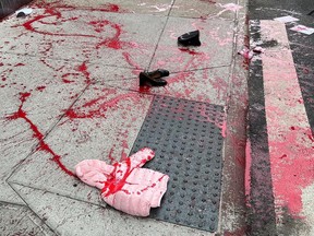Fake crime scene created on NYC street by artist Scott LoBaido.