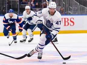 Toronto Maple Leafs left wing Pierre Engvall skates across center ice against the New York Islanders during the third period at UBS Arena.