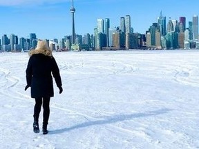 A woman is pictured on ice-covered Lake Ontario in this Instagram photo.