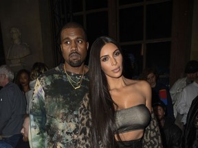 Kim Kardashian and Kanye West - Paris Fashion Show 2017 - Photoshot