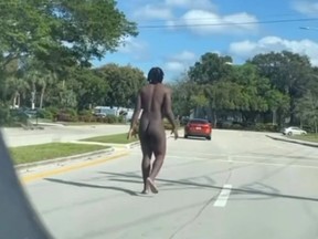 Cleveland Browns defensive back Malik McDowell strolls down a Florida street.