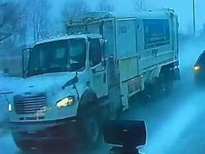 A snowplow's dashcam video shows a reckless driver in a near-miss with a large truck.