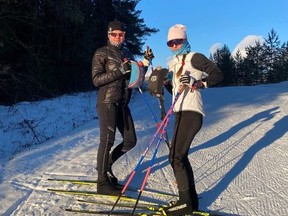 Belarusian cross-country skiers Darya Dolidovich and Sviatlana Andryiuk pose for a picture in Kirovo-Chepetsk, Russia December 5, 2021.