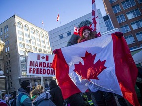 Thousands gathered in Ottawa's downtown core for a protest in connection with the Freedom Convoy that made their way from various locations across Canada, Saturday Jan. 29, 2022.