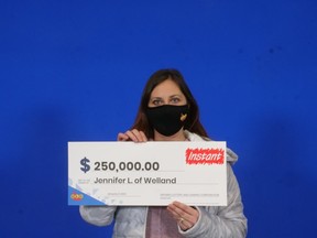 Jennifer Lafleur and her giant cheque.