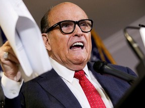 Former New York City Mayor Rudy Giuliani, then-personal attorney to U.S. President Donald Trump, speaks about the 2020 U.S. presidential election results during a news conference in Washington, U.S., November 19, 2020.