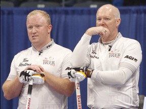 Third Scott Howard, chatting with father and skip Glenn Howard during the wild-card game,  in the 2020 Tim Hortons Brier in Kingston, Ont., is heading back to the national championship after beating John Epping 5-3 on Sunday.