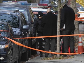 Montreal police investigators look for clues, at the scene of murder investigation at the corner of Hochelaga and Pierre-Tetreault on Tuesday Oct. 30, 2018. Yvon Marchand, a convicted drug dealer, was killed. Frédérick Silva was later charged with his murder.