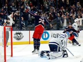 Patrik Laine of the Columbus Blue Jackets celebrates after beating Jack Campbell of the Toronto Maple Leafs for the game-winning goal in overtime at Nationwide Arena on February 22, 2022 in Columbus, Ohio. Columbus defeated Toronto 4-3 in overtime.