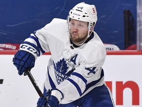 Morgan Rielly #44 of the Toronto Maple Leafs skates the puck against the Montreal Canadiens during the second period in Game Six of the First Round of the 2021 Stanley Cup Playoffs at the Bell Centre on May 29, 2021 in Montreal.