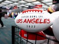 Super Bowl LVI footballs are displayed for sale in the NFL Shop at the Los Angeles Convention Center on February 7, 2022 in Los Angeles.