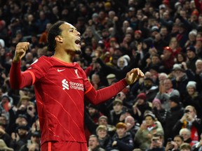 Liverpool's Virgil van Dijk celebrates scoring their sixth goal against Leeds United.