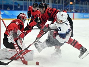 Canada plays the U.S. during the men's tournament at the Beijing Games. Winter Olympics hockey is just not the same without NHL players involved.