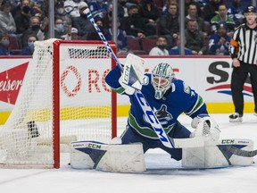 Canucks goalie Thatcher Demko makes one of his  51 saves against the Toronto Maple Leafs on Saturday night at Rogers Arena.