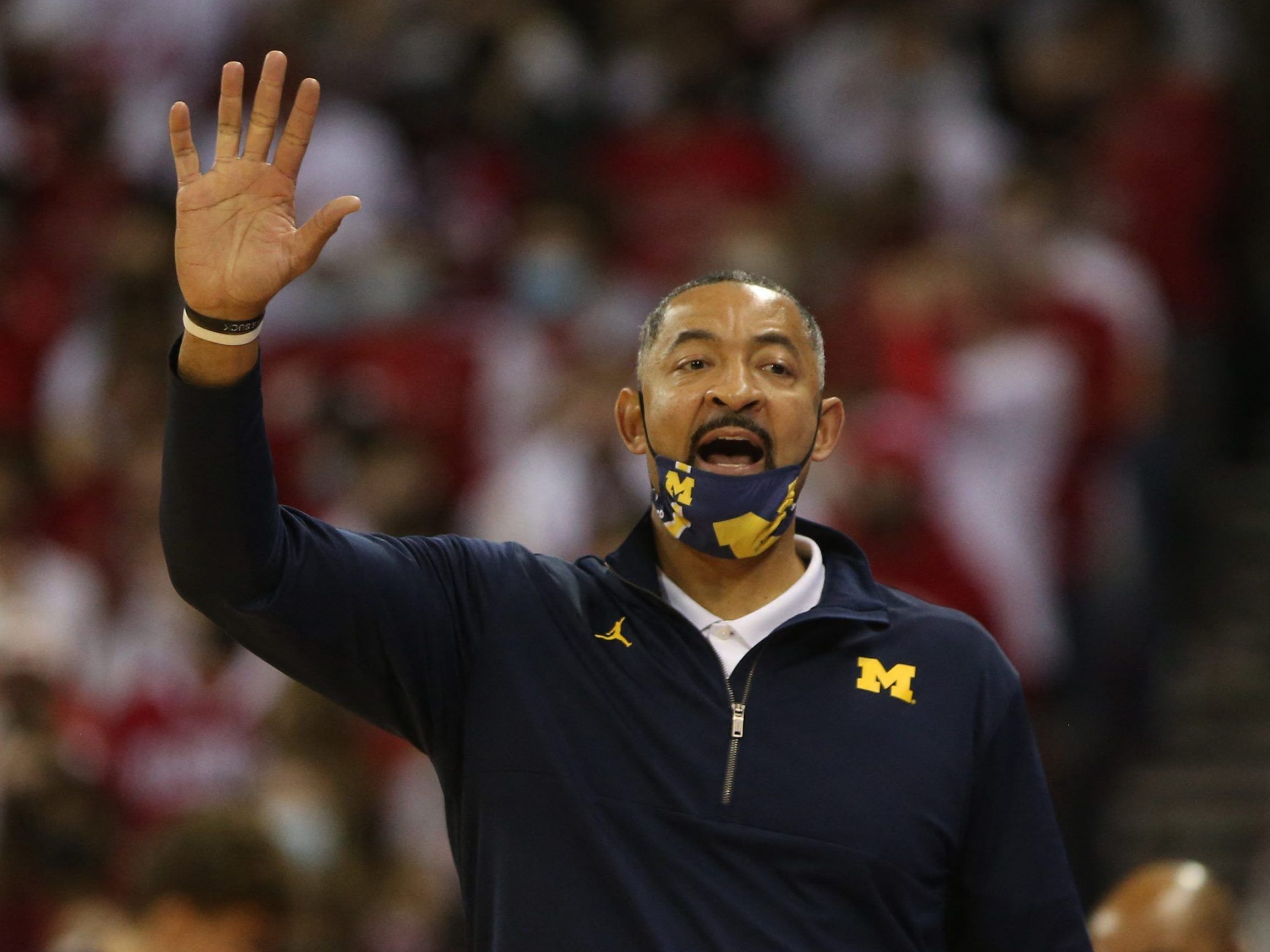 Basketball Brawl: Michigan Wolverines Coach Juwan Howard Throws Punch ...