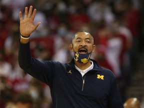 Michigan Wolverines head coach Juwan Howard  directs his team during the game with the Wisconsin Badgers at the Kohl Center in Madison, Wisc., Feb. 20, 2022.