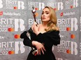 Adele poses with her award in the media room during The BRIT Awards 2022 at The O2 Arena on Feb. 8, 2022 in London.