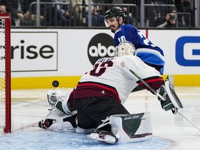Central Division goalie Cam Talbot (33) of the Minnesota Wild attempts a save against Metropolitan Division forward Chris Kreider (20) of the New York Rangers during the 2022 NHL All-Star Game at T-Mobile Arena.