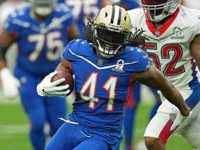 NFC running back Alvin Kamara of the New Orleans Saints runs with the ball against the AFC during the Pro Bowl at Allegiant Stadium.