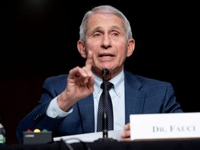 Dr. Anthony Fauci, director of the National Institute of Allergy and Infectious Diseases, responds to questions from Senator Rand Paul (R-KY) during a Senate Health, Education, Labor, and Pensions Committee hearing to examine the federal response to COVID-19 and new emerging variants, at Capitol Hill in Washington, D.C., Jan. 11, 2022.