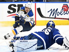 St. Louis Blues forward Brayden Schenn (10) watches the puck deflect off Toronto Maple Leafs goalie Jack Campbell (35) for a goal at Scotiabank Arena.